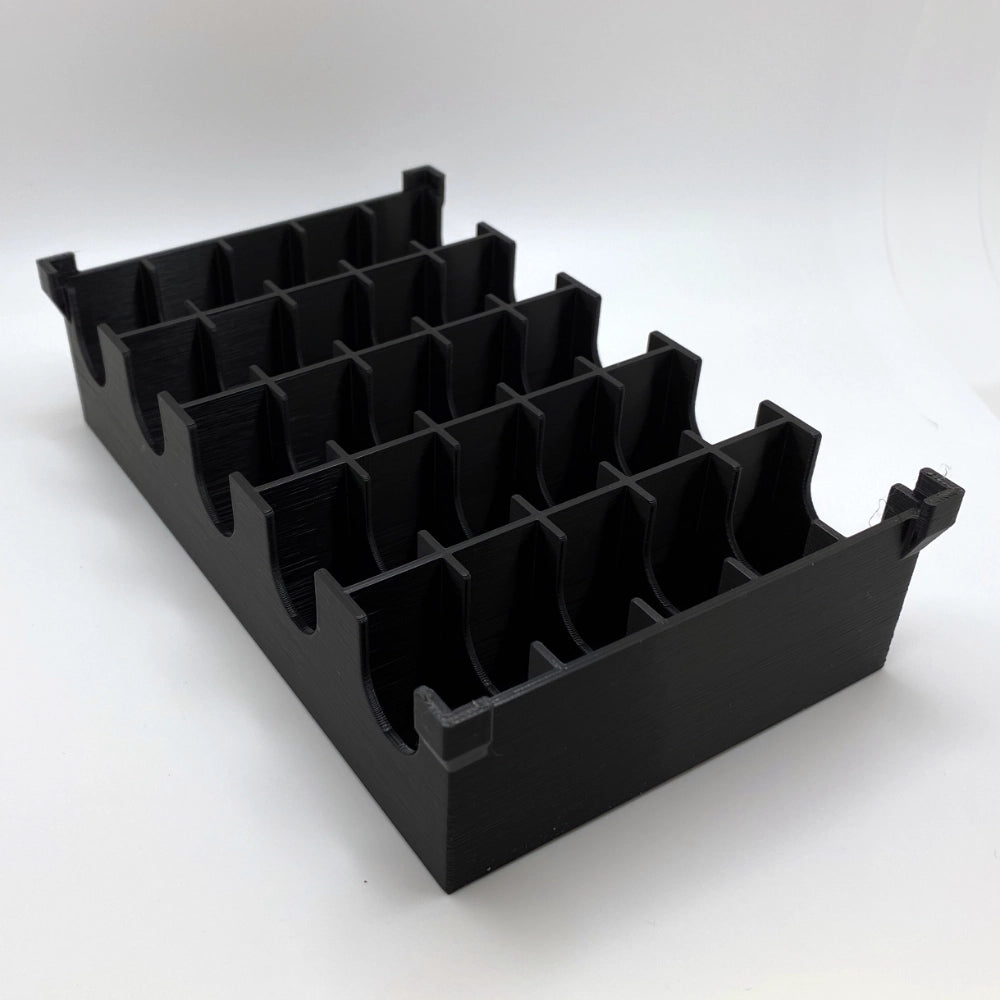 Black plastic organizer with multiple compartments on a white background