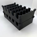 Black plastic crate with multiple compartments on a white background