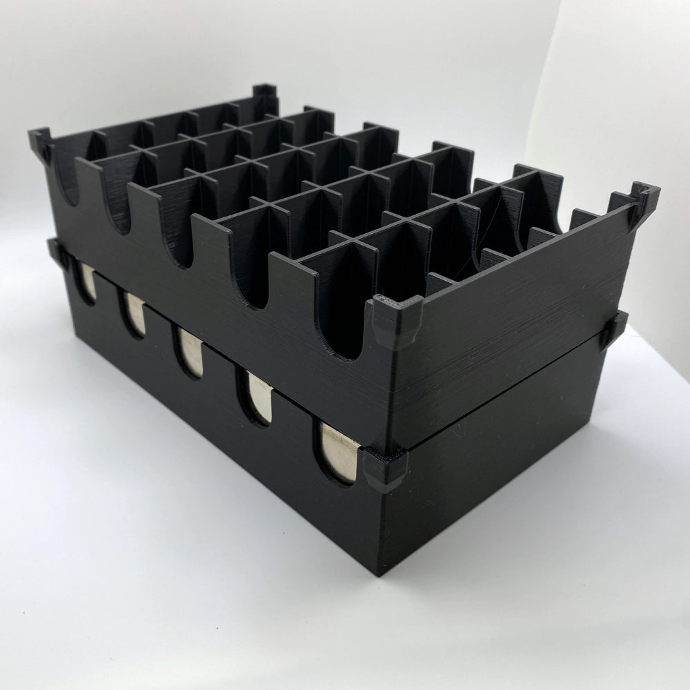 Black plastic organizer with multiple compartments on a white background