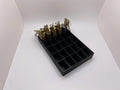Black tray with compartments holding locks on a white background